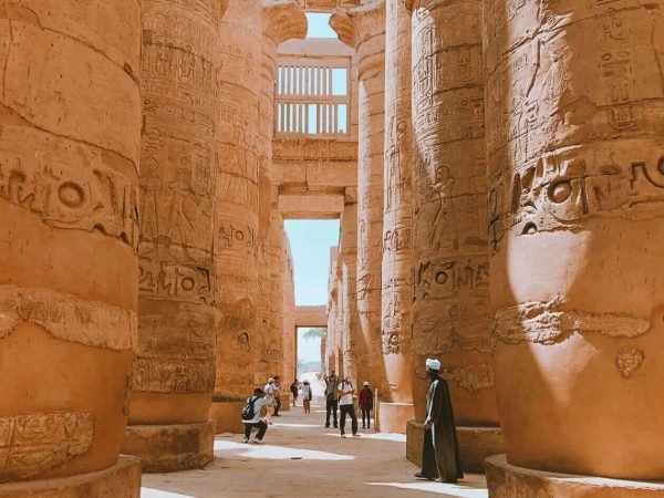 A-picture-of-some-visitors-near-the-columns-of-Karnak-Temple